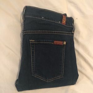 Blue slim illusion 7s skinny jeans in size 27